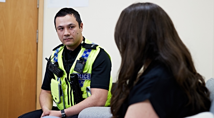 Cheshire Police Officer talking to victim of stalking crime