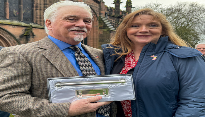 Christopher Maus and wife Rhonda with the Freedom of the Town outside St Marys Nantwich