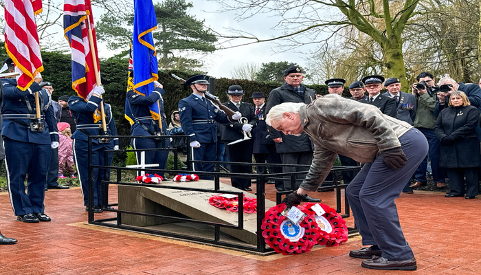 Christopher Maus nephew of Lt Brown lays his wreath at the Airman’s Grave’ memorial site