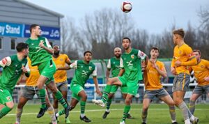 First-half - Scott Butler heads the ball into the danger area (1)
