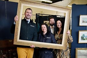 Picture shows Laura Rees, right, and Lewis McMullin, left, of FW Capital with owners of Wilson55 Auctioneers Sharon, centre left, and Stephen Sparrow, Nantwich, Cheshire, 9th Feb, 2024. (Picture Jon Super)