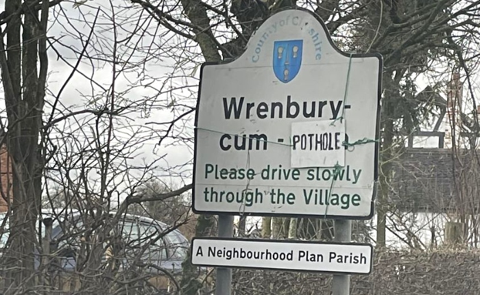 wrenbury pothole sign