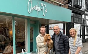 Charlie + Co owners with Paphitis outside store