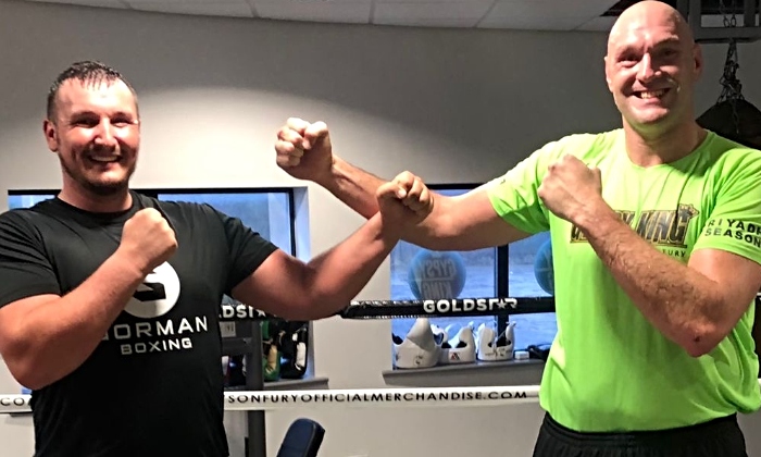 Ricky (left) with Tyson Fury at training camp