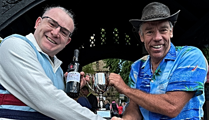 Adult race winner Rod Morgan-Smith (left) receives his trophy and prize from Mark Walker (1)