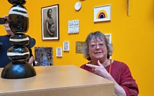 Barbara with her ceramic sculpture _STONED_ at Royal Academy of Arts show