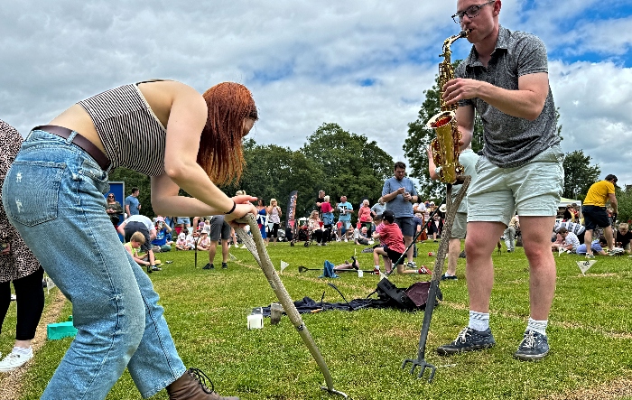 Friend and saxophonist look to entice the worms (1)