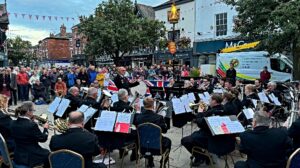 Spectators watch the Cheshire Police Band after the D-Day 80 beacon is lit (1)