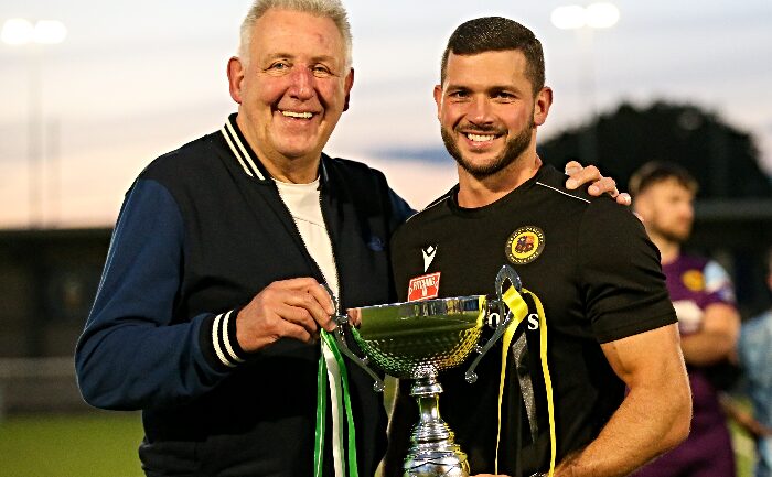 Nantwich Town FC Chairman Jon Gold (left) presents the 1884 Cup to the Cables captain