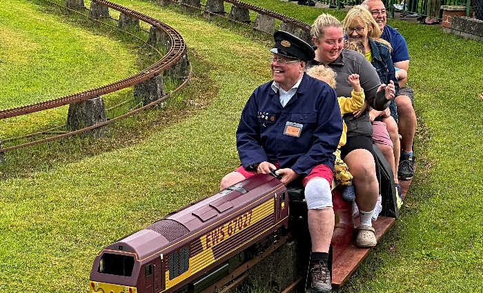 Visitors enjoy a miniature-gauge train ride (2) (1)