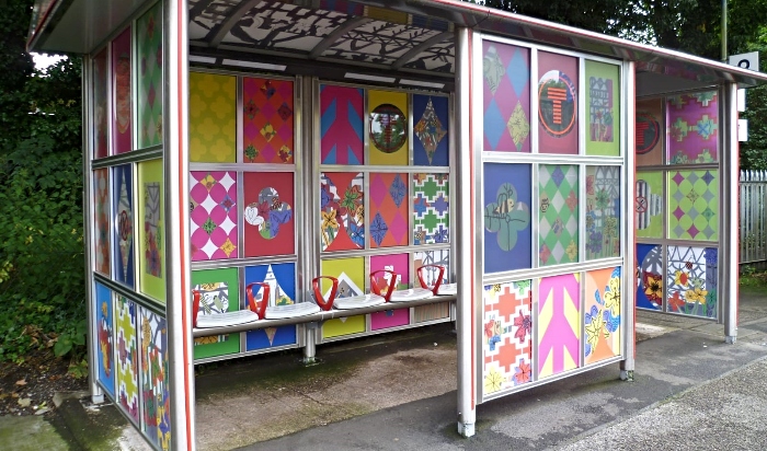 train station shelters with pupils' artwork