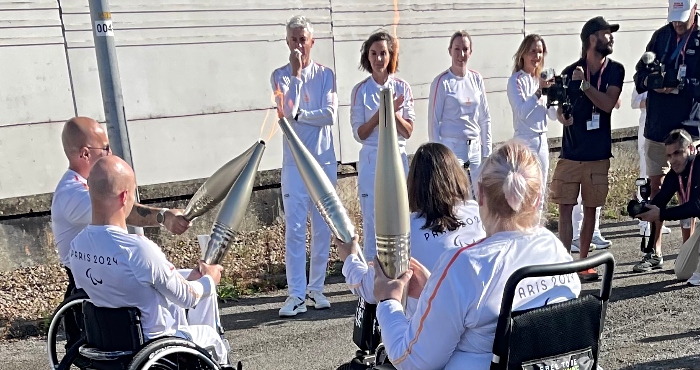 Andy Small and others hand over Paralympic torch to France