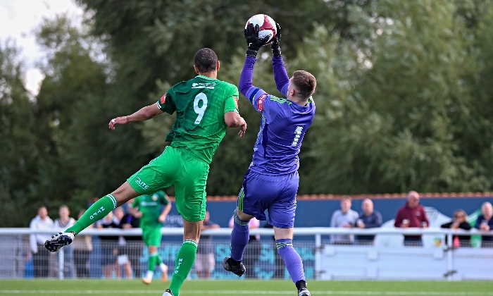 First-half - Byron Harrison challenges keeper Kyle Haslam for the ball (1)