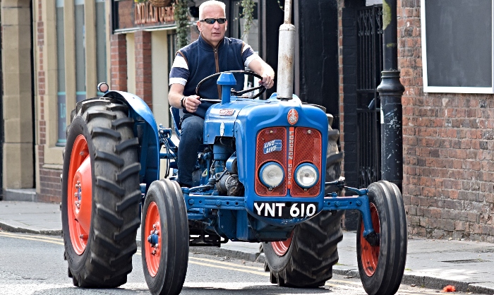 Michael-John Parkin drives his tractor during the road run (1)