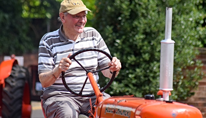 Tractor owner enjoys participating in the vehicle parade (1)