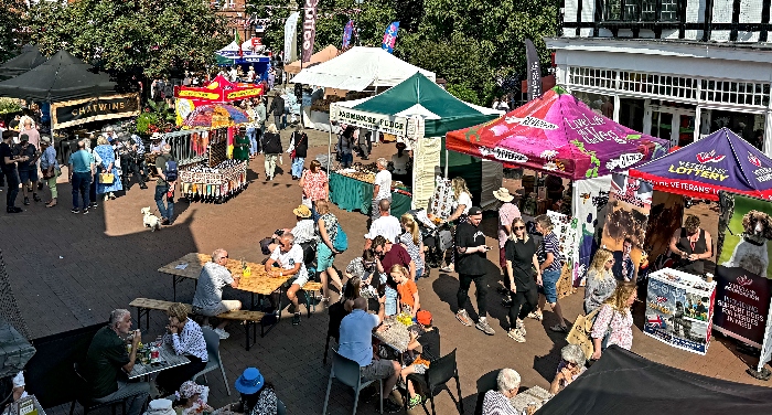 Visitors view the stalls on Boughey Food Market on the town square (1)