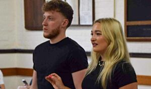 Cast members Kieran Picken and Chloe Parr during rehearsals