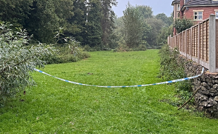 area cordoned off between river and Shrewbridge Rd houses