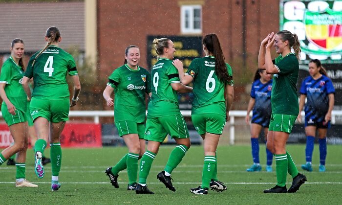 Amanda Fallon (centre) celebrates scoring one of her goals with teammates