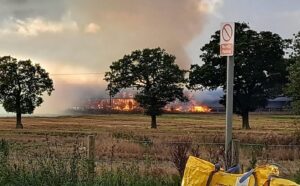 Fire crews tackle huge barn fire near Leighton Hospital