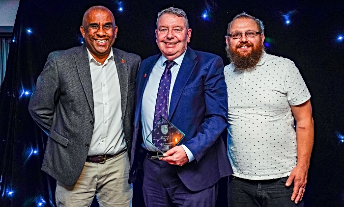 Clive Jackson (centre) receives his Changing Lives Through Football Award (1)