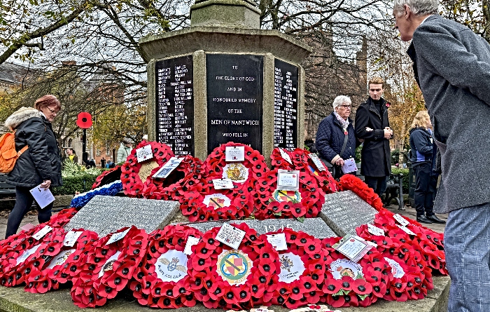 Members of congregation view the wreathes after the Remembrance Service (1)