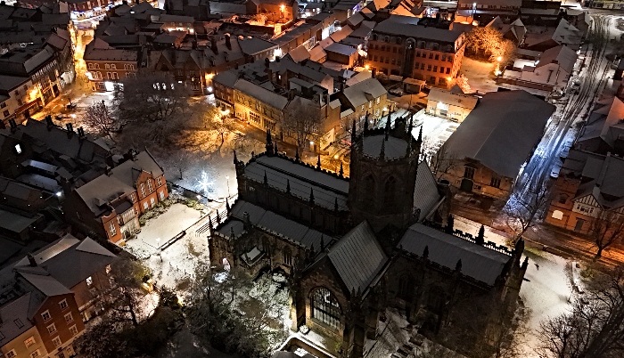 aerial of snow in town centre