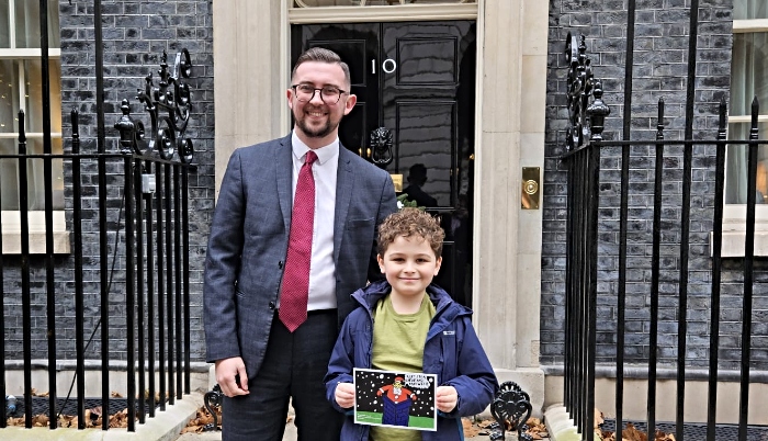 Oliver at Downing Street with Christmas card