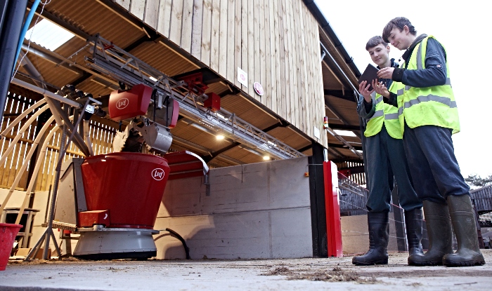 Students monitor the Vector feed system