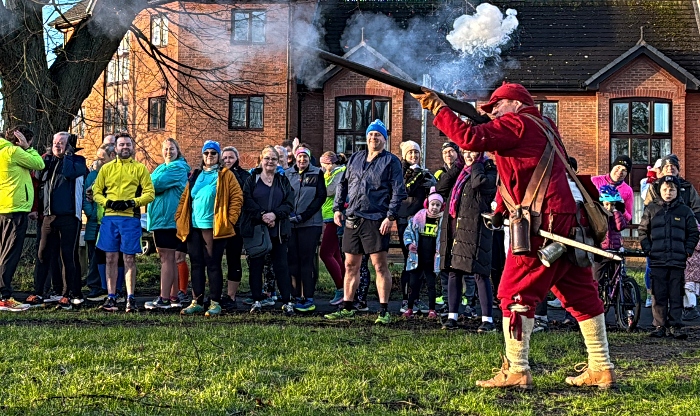 Alex Thompson, from the Sealed Knot, fires his musket to start the Dash (1)