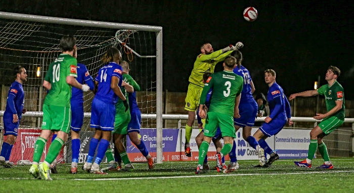 Second-half - Wythenshawe Town keeper Greg Hall punches the ball clear (1)