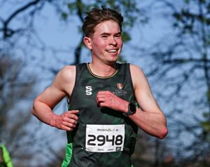 Andrew Moore (Bangor University Ac) smiles on en route to victory (2) (1)