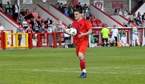 Connor Hooks prepares to score his winning penalty for George & Dragon (1)