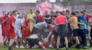 George & Dragon FC and fans celebrate winning the Cheshire FA Sunday Challenge Cup at full-time (1)