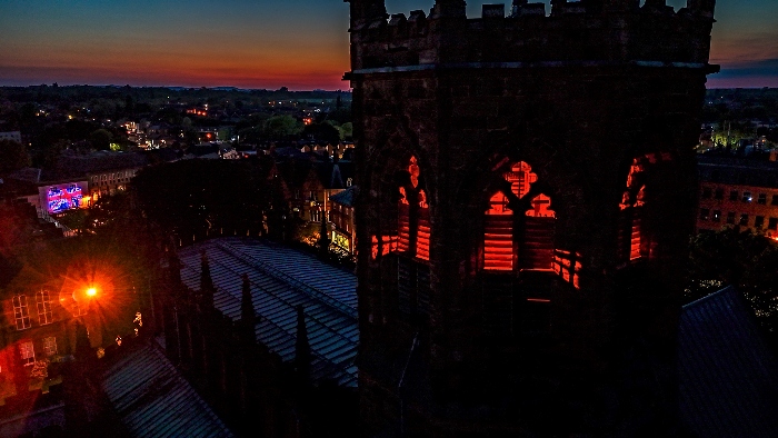 St Mary's tower looks over beacon and red sunset