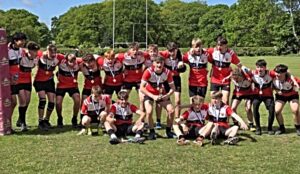 Crewe & Nantwich RUFC under 15s celebrate as Shield winners