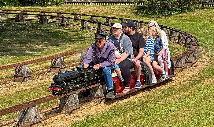 Visitors enjoy a miniature steam train ride (1)