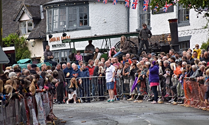 A competitor in the Adult race rolls her pie on Main Road (1)