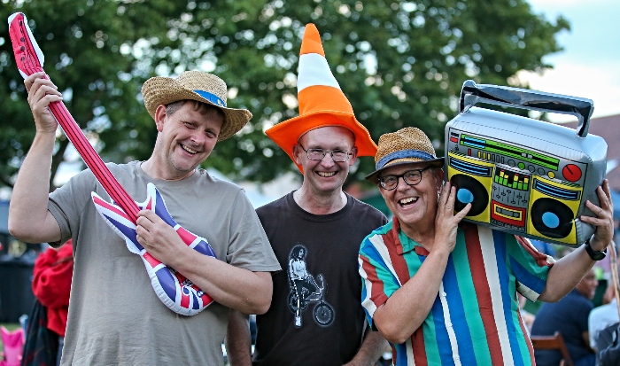 Audience member l-r Andrew Feltham, Chris White and Mark Ray enjoy the music (1)