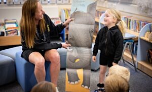 Pear Tree Primary receives book donation from house builder