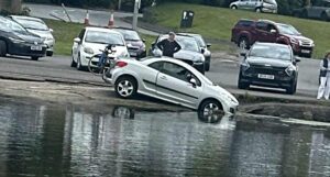 Onlookers stunned as car ends up in Nantwich Lake