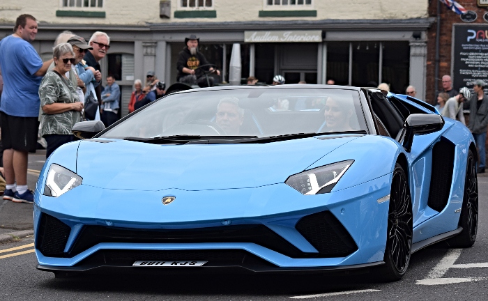 A brightly coloured Lamborghini Aventador turns heads in the vehicle parade (1)