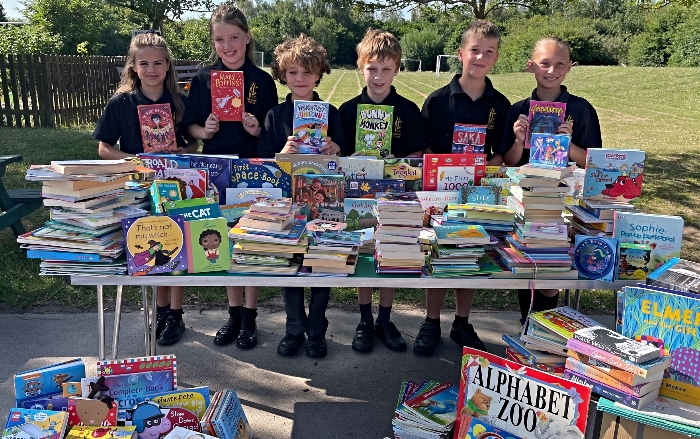 Year 5 pupils at Pear Tree who collected for BeBook