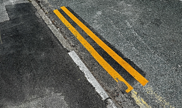 Double yellow line paint patches on a road in Wistaston - Aug 2025 (4) (1)