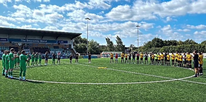 Pre-match - a minutes applause in memory of Mikey (1)