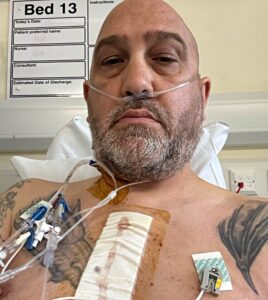 Darren Dale at Wythenshawe Hospital after triple heart bypass