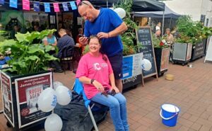 Nantiwch Town Square cheers for woman’s “brave the shave” effort