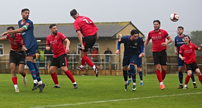First-half - Dabbers captain Kelvin Mellor (far-left) heads at goal (1)