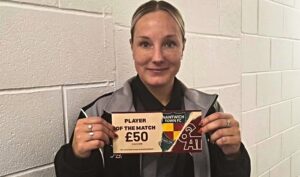 GOAT Player of the Match - Amanda Fallon with her voucher - pic by Staci Howell