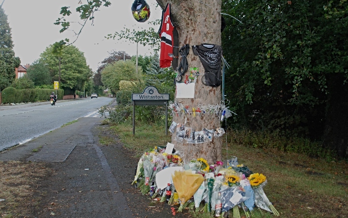 flowers and tributes at crash site